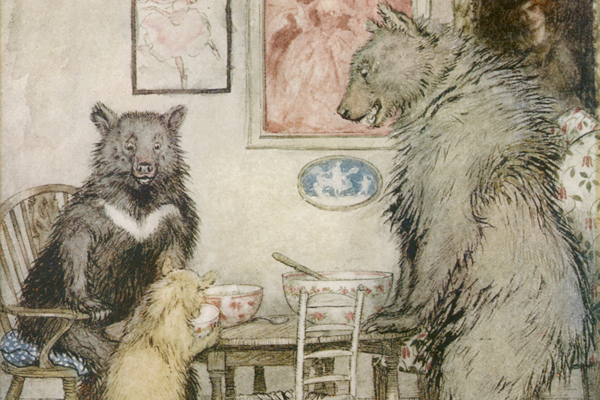 Cartoon image of the three bears from the Goldilocks story eating porridge.